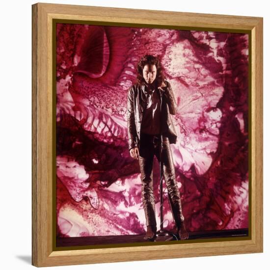 Rock Star Jim Morrison of the Doors Singing Alone on Stage in Front of a Psychedelic Backdrop-Yale Joel-Framed Premier Image Canvas