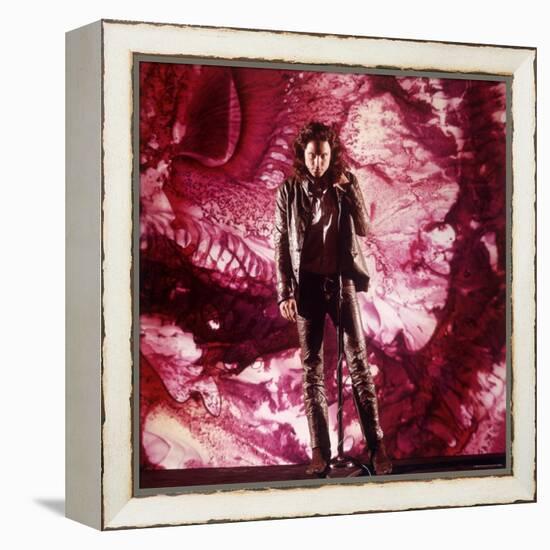 Rock Star Jim Morrison of the Doors Singing Alone on Stage in Front of a Psychedelic Backdrop-Yale Joel-Framed Premier Image Canvas