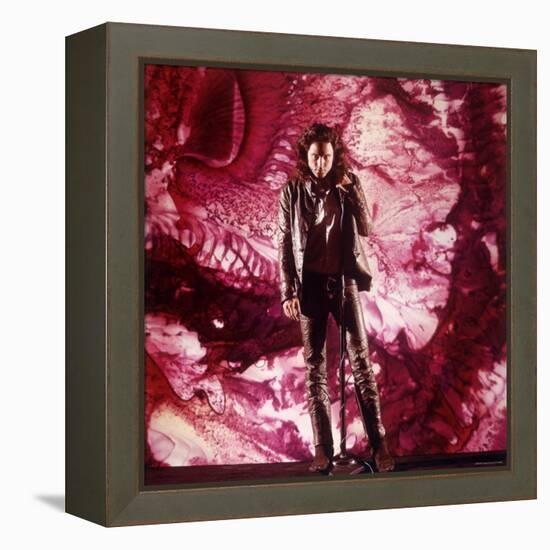 Rock Star Jim Morrison of the Doors Singing Alone on Stage in Front of a Psychedelic Backdrop-Yale Joel-Framed Premier Image Canvas