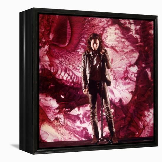 Rock Star Jim Morrison of the Doors Singing Alone on Stage in Front of a Psychedelic Backdrop-Yale Joel-Framed Premier Image Canvas