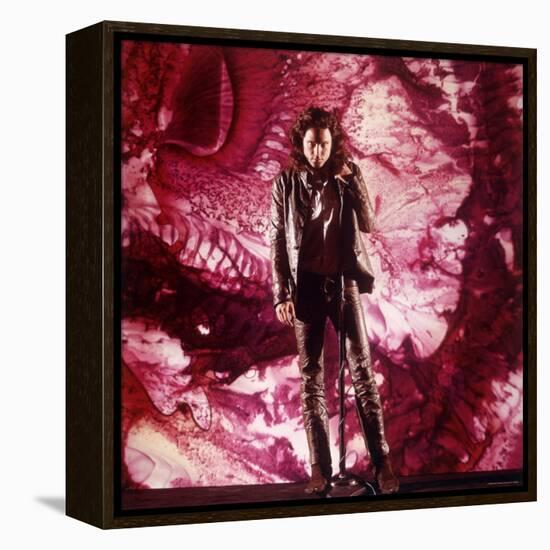 Rock Star Jim Morrison of the Doors Singing Alone on Stage in Front of a Psychedelic Backdrop-Yale Joel-Framed Premier Image Canvas