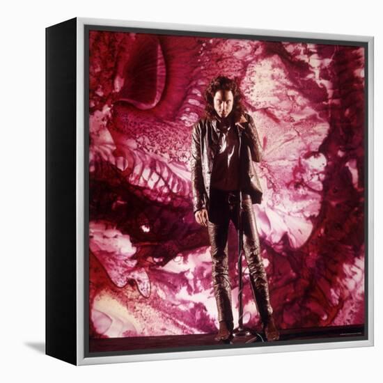 Rock Star Jim Morrison of the Doors Singing Alone on Stage in Front of a Psychedelic Backdrop-Yale Joel-Framed Premier Image Canvas