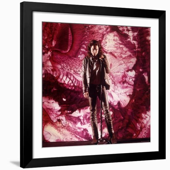 Rock Star Jim Morrison of the Doors Singing Alone on Stage in Front of a Psychedelic Backdrop-Yale Joel-Framed Premium Photographic Print