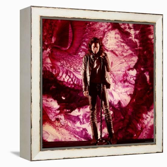 Rock Star Jim Morrison of The Doors Singing on Stage in Front of a Purple Psychedelic Backdrop-Yale Joel-Framed Premier Image Canvas