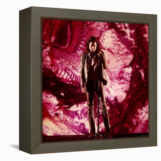 Rock Star Jim Morrison of The Doors Singing on Stage in Front of a Purple Psychedelic Backdrop-Yale Joel-Framed Premier Image Canvas