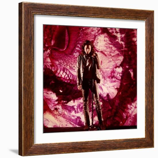 Rock Star Jim Morrison of The Doors Singing on Stage in Front of a Purple Psychedelic Backdrop-Yale Joel-Framed Premium Photographic Print