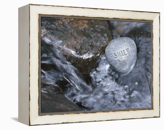 Rock with the Word Smile in Rushing Water-null-Framed Premier Image Canvas