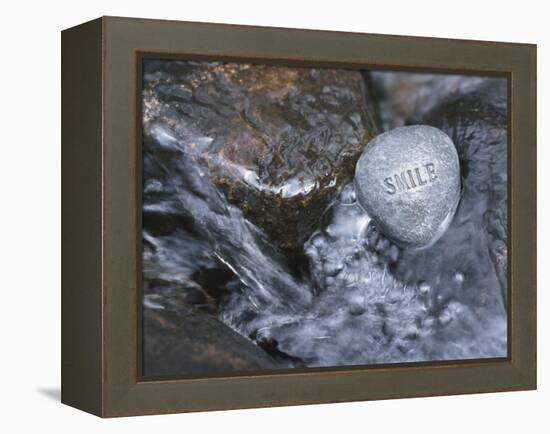 Rock with the Word Smile in Rushing Water-null-Framed Premier Image Canvas