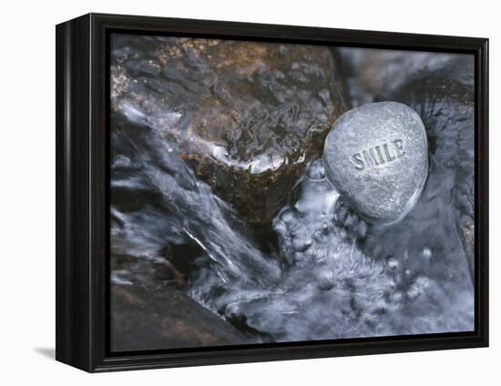 Rock with the Word Smile in Rushing Water-null-Framed Premier Image Canvas