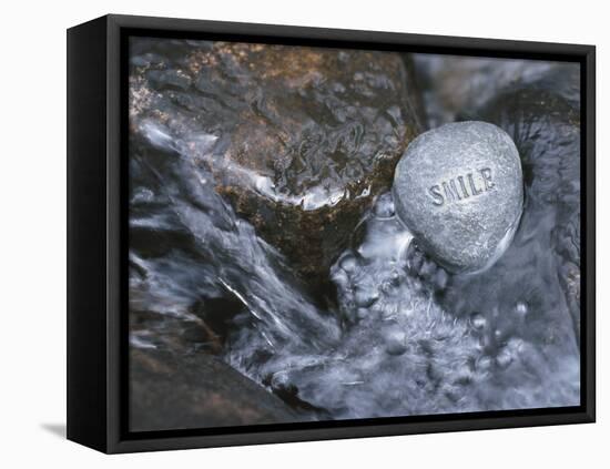 Rock with the Word Smile in Rushing Water-null-Framed Premier Image Canvas