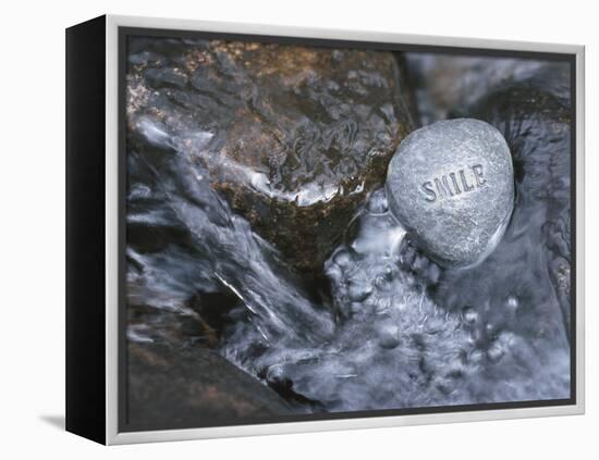 Rock with the Word Smile in Rushing Water-null-Framed Premier Image Canvas