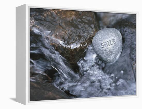 Rock with the Word Smile in Rushing Water-null-Framed Premier Image Canvas