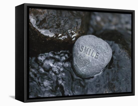 Rock with the Word Smile in Rushing Water-null-Framed Premier Image Canvas