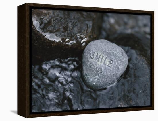 Rock with the Word Smile in Rushing Water-null-Framed Premier Image Canvas