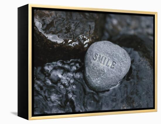 Rock with the Word Smile in Rushing Water-null-Framed Premier Image Canvas