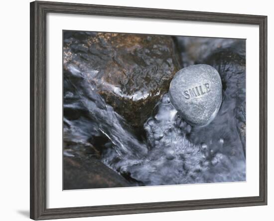 Rock with the Word Smile in Rushing Water-null-Framed Photographic Print