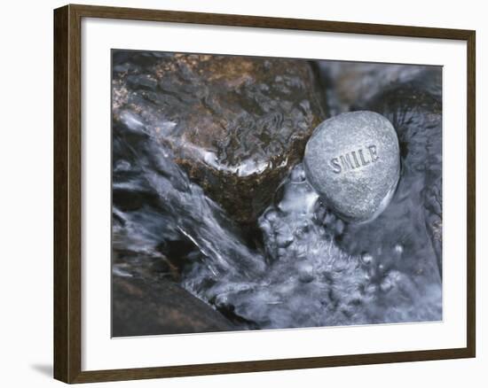 Rock with the Word Smile in Rushing Water-null-Framed Photographic Print