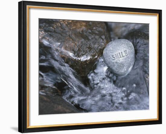 Rock with the Word Smile in Rushing Water-null-Framed Photographic Print