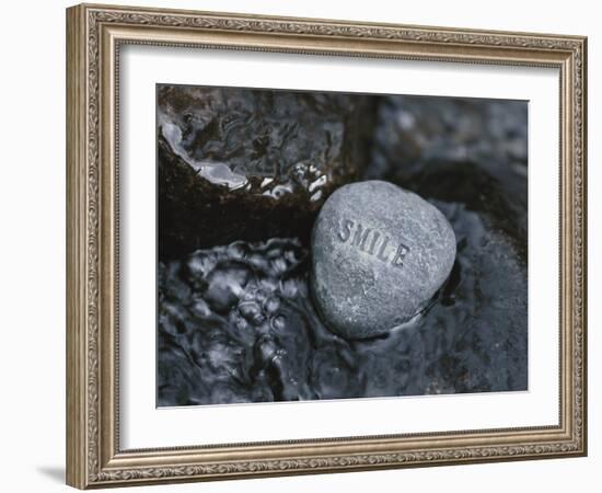 Rock with the Word Smile in Rushing Water-null-Framed Photographic Print