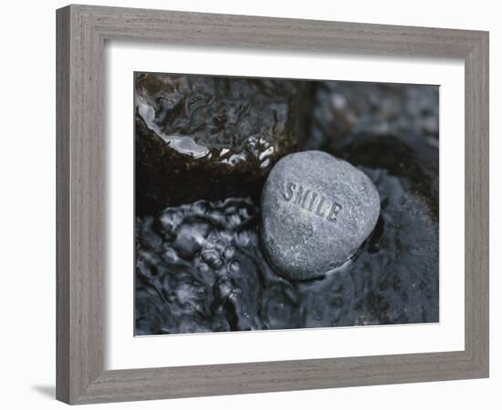 Rock with the Word Smile in Rushing Water-null-Framed Photographic Print