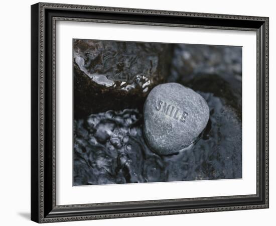 Rock with the Word Smile in Rushing Water-null-Framed Photographic Print