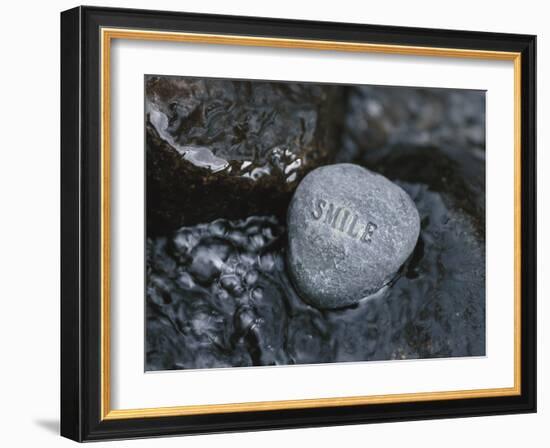 Rock with the Word Smile in Rushing Water-null-Framed Photographic Print