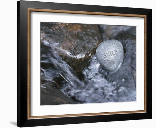 Rock with the Word Smile in Rushing Water-null-Framed Photographic Print