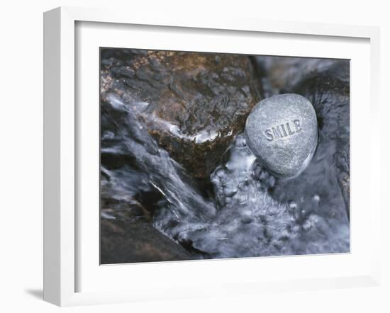 Rock with the Word Smile in Rushing Water-null-Framed Photographic Print