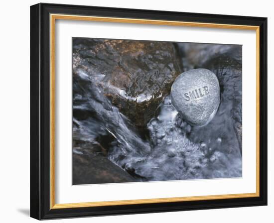 Rock with the Word Smile in Rushing Water-null-Framed Photographic Print