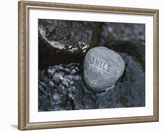 Rock with the Word Smile in Rushing Water-null-Framed Photographic Print