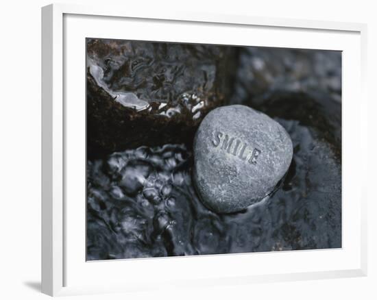 Rock with the Word Smile in Rushing Water-null-Framed Photographic Print