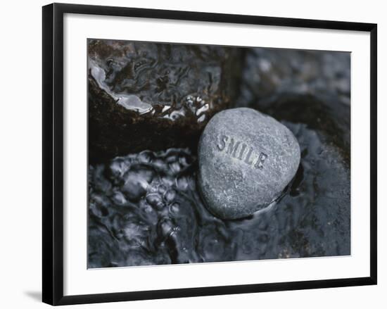 Rock with the Word Smile in Rushing Water-null-Framed Photographic Print