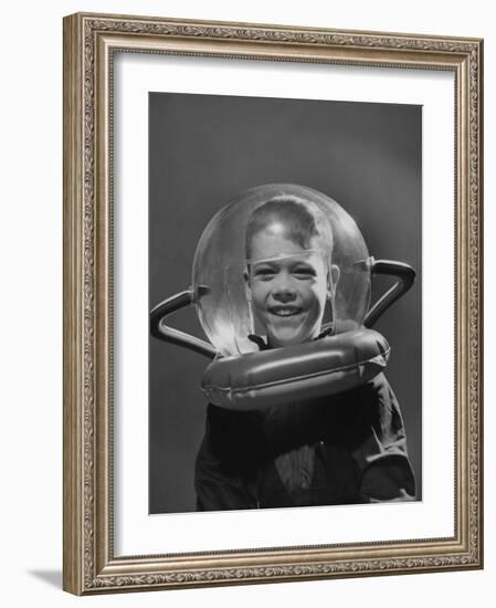 Rocket Ship Prize, Boy Wearing Space Helmet-Yale Joel-Framed Photographic Print