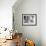 Rocking Chair with Guitar-Zhen-Huan Lu-Framed Photographic Print displayed on a wall