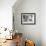 Rocking Chair with Guitar-Zhen-Huan Lu-Framed Photographic Print displayed on a wall