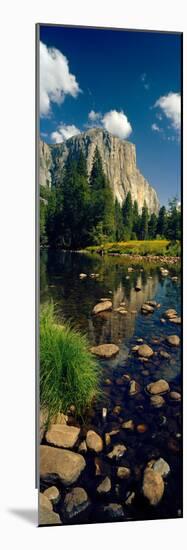 Rocks in a Lake with Mountain in the Background-null-Mounted Photographic Print