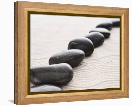 Rocks on sand-John Smith-Framed Premier Image Canvas