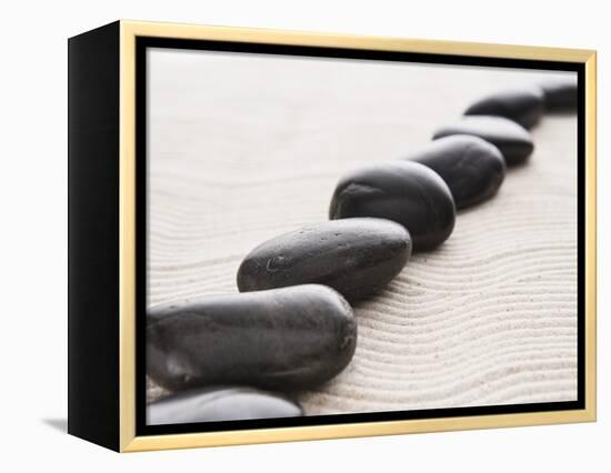 Rocks on sand-John Smith-Framed Premier Image Canvas
