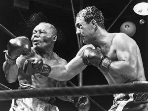 Rocky Marciano Landing a Punch on Jersey Joe Walcott, Sept. 23, 1952