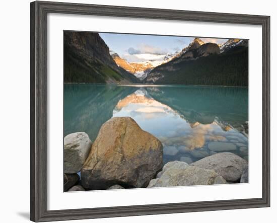 Rocky Mountains and boulders reflected in Lake Louise, Banff National Park, Alberta, Canada-Larry Ditto-Framed Photographic Print