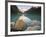 Rocky Mountains and boulders reflected in Lake Louise, Banff National Park, Alberta, Canada-Larry Ditto-Framed Photographic Print