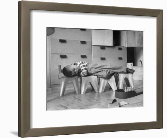 Rocky Stensrud, Jr., Using Children's Chairs in a Home to Make a Train Upon Which He Can Sleep-Joe Scherschel-Framed Photographic Print