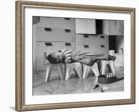Rocky Stensrud, Jr., Using Children's Chairs in a Home to Make a Train Upon Which He Can Sleep-Joe Scherschel-Framed Photographic Print