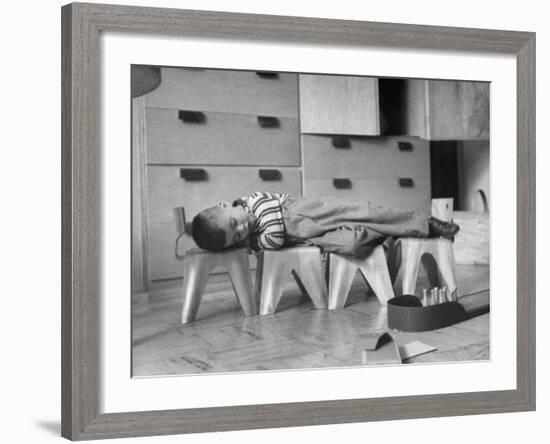 Rocky Stensrud, Jr., Using Children's Chairs in a Home to Make a Train Upon Which He Can Sleep-Joe Scherschel-Framed Photographic Print