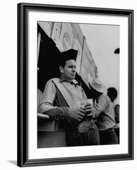 Rodeo Star Casey Tibbs Standing at a Rodeo-Nat Farbman-Framed Premium Photographic Print