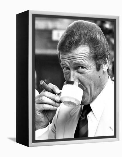 Roger Moore Drinking Coffee-Associated Newspapers-Framed Stretched Canvas