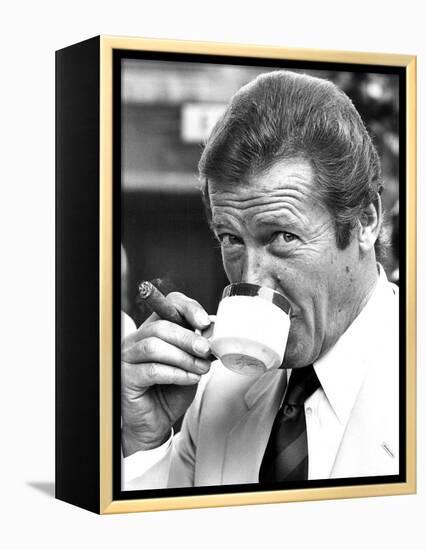 Roger Moore Drinking Coffee-Associated Newspapers-Framed Stretched Canvas