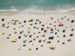 Umbrella Pattern on Beach by Roger Wright