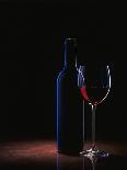 A Glass of Red Wine and a Wine Bottle-Roland Krieg-Photographic Print