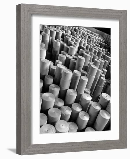 Rolls of Kraft Paper to Be Made into Paper Sacks Sit Stacked in the Union Bag and Paper Corp. Plant-Margaret Bourke-White-Framed Photographic Print